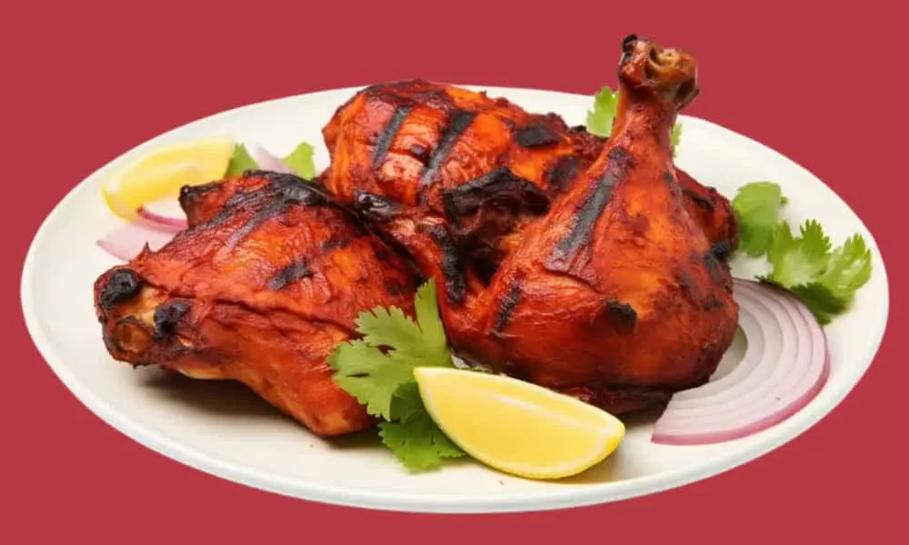 Delicious Tandoori Chicken cooked in clay oven at Samosa House Calgary